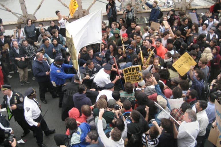 Protestors gather on the Brooklyn Bridge.