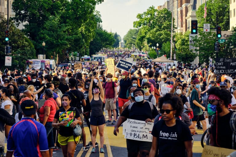 Large group of people protesting at a Black Lives Matter march
