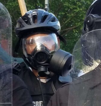 Police officer in riot gear