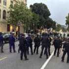 Police offices block the street in San Francisco during the Dolores Park Hill Bomb