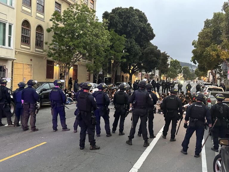 Police offices block the street in San Francisco during the Dolores Park Hill Bomb