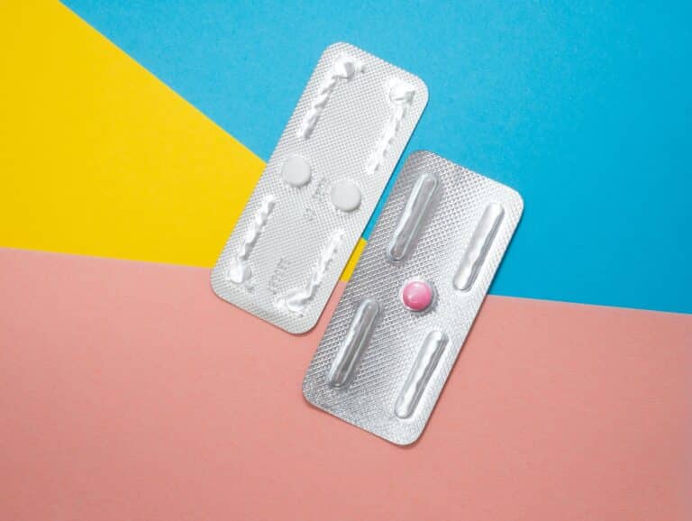 Photo of two pill packs of Plan B on a colorful background