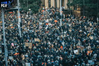 A large group of protestors in the street